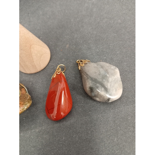 672 - Four vintage Agate stone pendants.