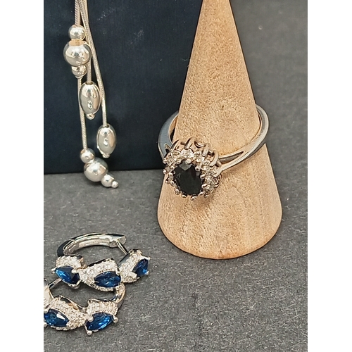 677 - 925 silver necklace L 46cm, 925 silver blue and diamanté stone hoop earrings and a 925 silver black ... 