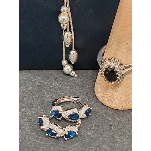 677 - 925 silver necklace L 46cm, 925 silver blue and diamanté stone hoop earrings and a 925 silver black ... 