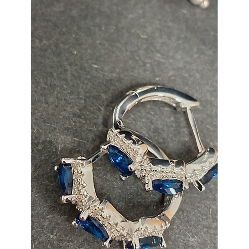 677 - 925 silver necklace L 46cm, 925 silver blue and diamanté stone hoop earrings and a 925 silver black ... 