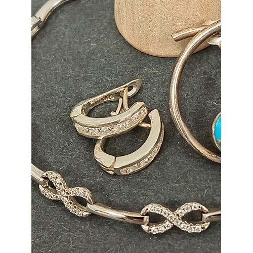 687 - 925 silver lever back diamanté earrings, 925 silver infinity diamanté bracelet 20cm and a pair of 92... 