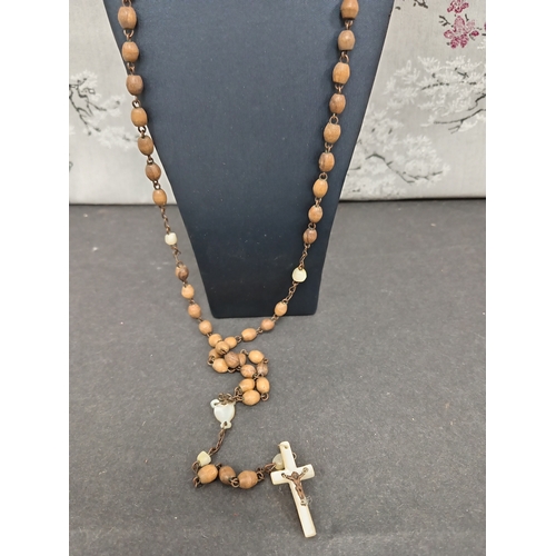 691 - Vintage olive wood and mother of pearl Rosary beads.