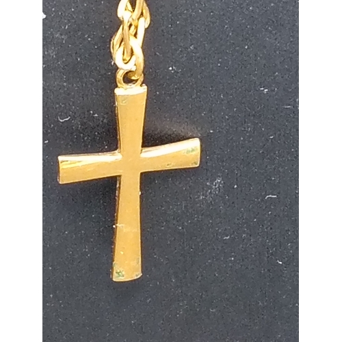 698 - Rolled gold Cross pendant on a 18k plated chain L 50cm.