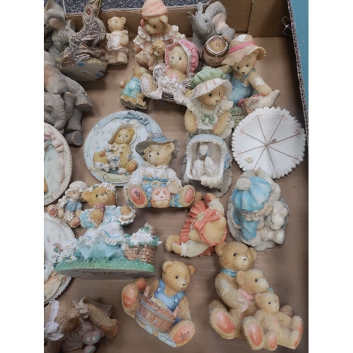 590 - An assortment of 7 resin elephants, 2 carved stone elephants and 19 resin bears.