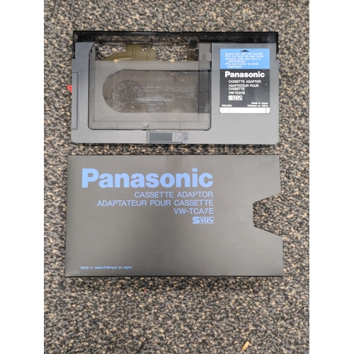 609 - Panasonic G101 VHS-C Movie camera with a Panasonic cassette adapter