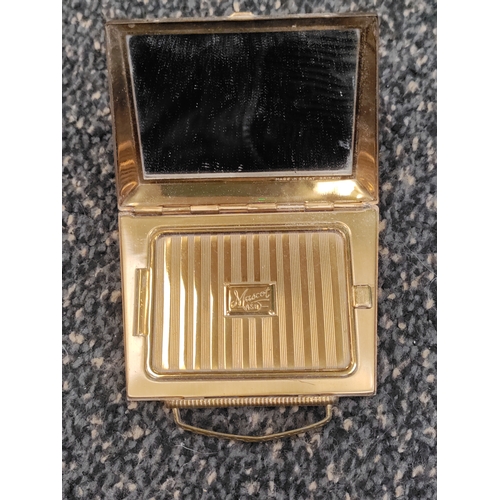 561 - A job lot of 12 compacts, some mirrors, a perfume bottle and a brush. Brands include Stratton, Etien... 