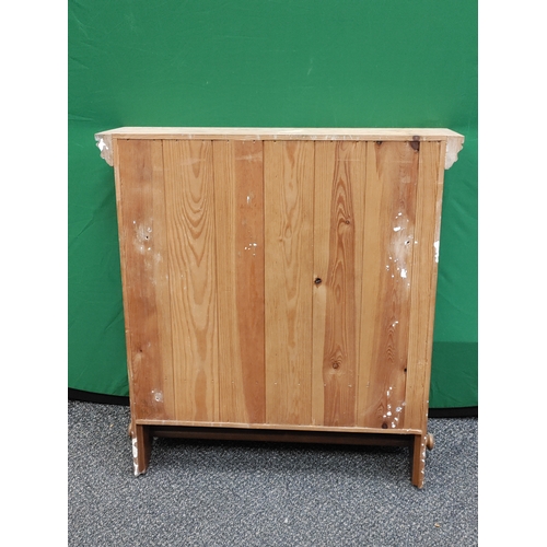 585 - A pine kitchen cabinet with 2 drawers and a kitchen roll/tea towel holder. H 68cm x W 64cm x D 17cm.