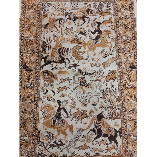 580 - A vintage brown and cream silk rug with tassels picturing men with swords on horse back.