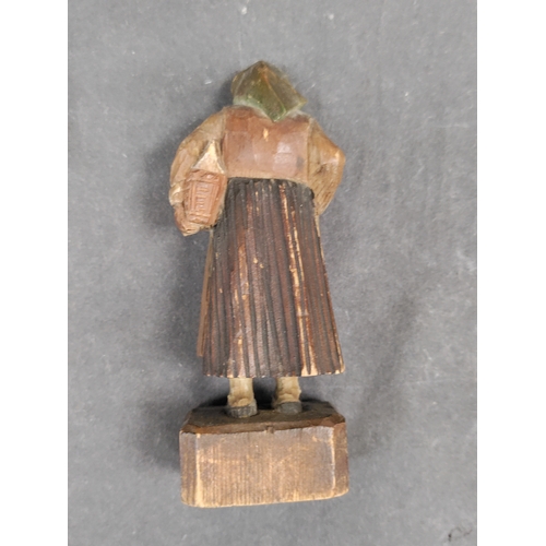 595 - A pair of antique wooden black forest wood carving figures of a man and woman. The man could be Mr p... 