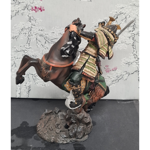 601 - Samurai Warrior on Horse Resin Figurine. Measures H30cm x W22cm