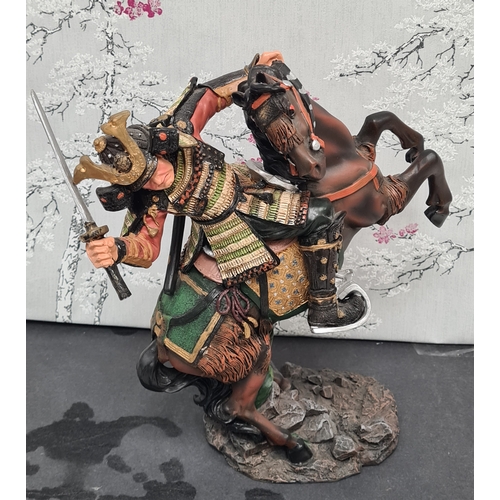 601 - Samurai Warrior on Horse Resin Figurine. Measures H30cm x W22cm