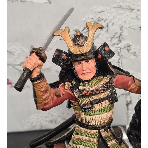 601 - Samurai Warrior on Horse Resin Figurine. Measures H30cm x W22cm