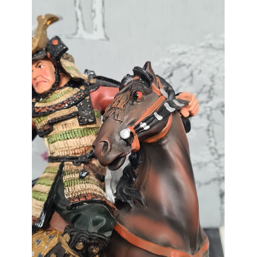 601 - Samurai Warrior on Horse Resin Figurine. Measures H30cm x W22cm