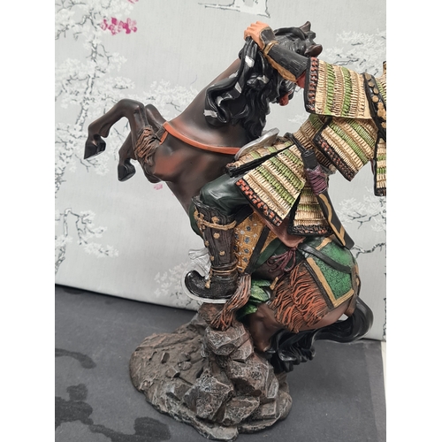 601 - Samurai Warrior on Horse Resin Figurine. Measures H30cm x W22cm