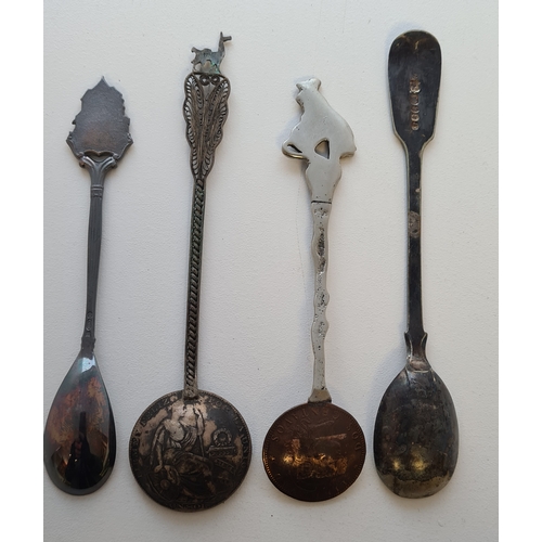 629 - Collection of 4 decorative tea/salt spoons, some silver including 2 coin spoons.