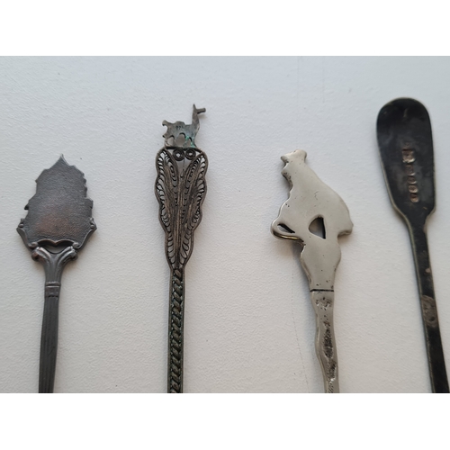 629 - Collection of 4 decorative tea/salt spoons, some silver including 2 coin spoons.