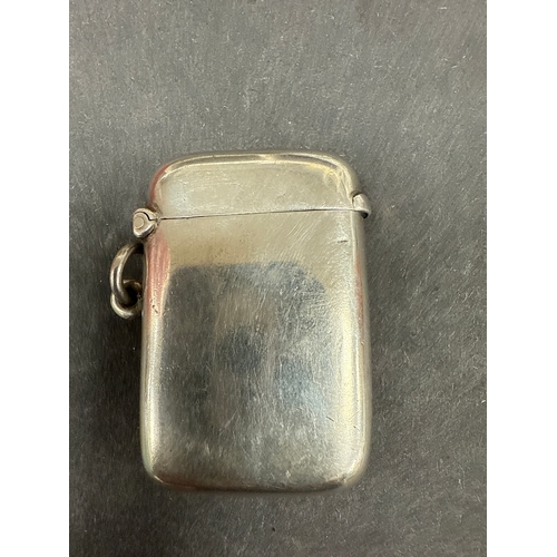 706 - Sterling silver vesta case and a cigarette case. Vesta weighs 26 grams