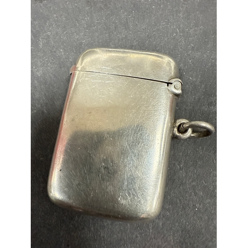 706 - Sterling silver vesta case and a cigarette case. Vesta weighs 26 grams