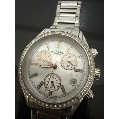 715 - Rotary watch, mother of pearl face and diamante bezel. Fully functional