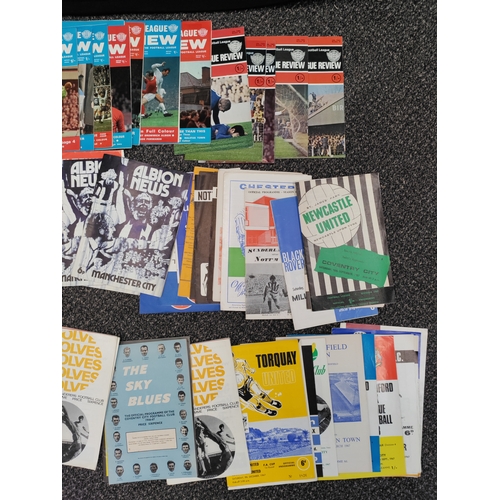 645 - A large collection of football programmes. Teams include Manchester city, Torquay United, Sheffield ... 