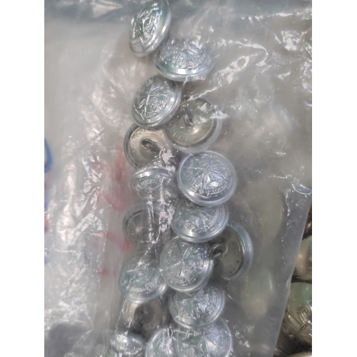 666 - A job lot of 10 bags of military buttons. Brands include Gaunt, Buttons Ltd B'ham and Badge London.