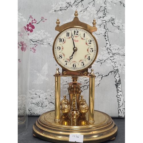 407 - Kundo Brass Carriage Clock with glass dome and detailed dial; Made by Kieninger & Obergfell of Germa... 