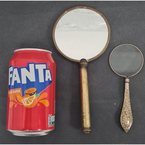 409 - Vintage Ladies handheld vanity mirror and a magnifying glass with ornate designed handle.