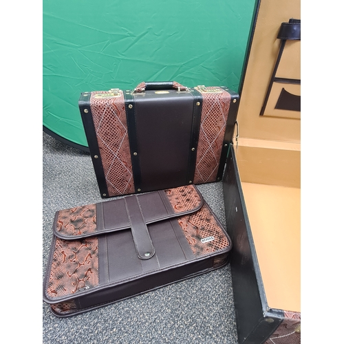 412 - Stylish Suitcase Set by Royal with faux snake skin design; this includes a suitcase, a knife case fo... 