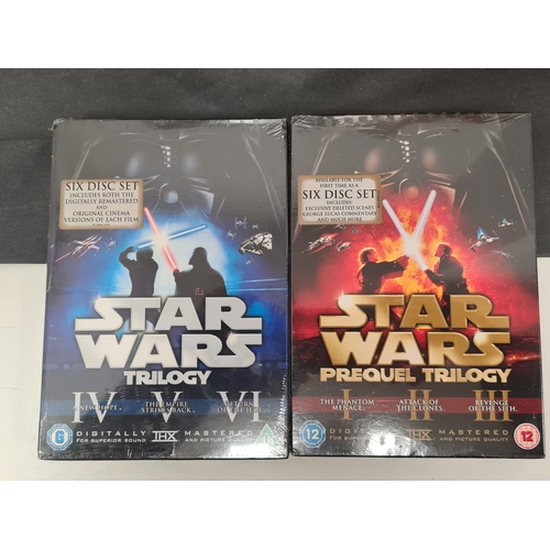 418 - Job lot of 6 DVD box sets to include: Star Wars 1-3 & 4-6, Sharpe, 7 wonders of the World, World War... 