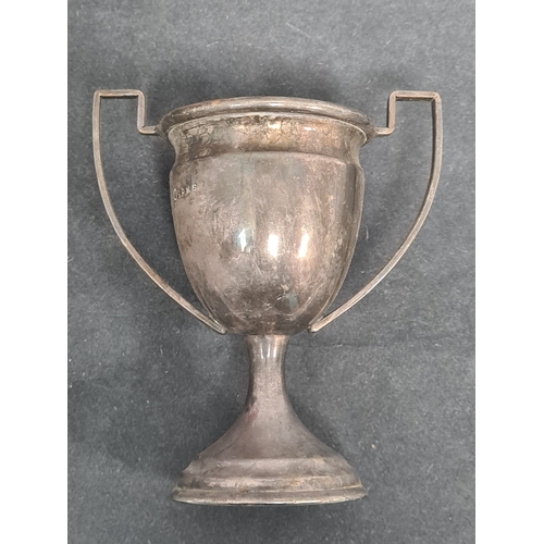 725 - One hallmarked silver small trophy cup and one small trophy cup stamped EPNS to include: Arcadian LT... 