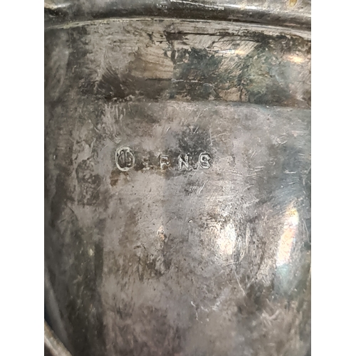 725 - One hallmarked silver small trophy cup and one small trophy cup stamped EPNS to include: Arcadian LT... 