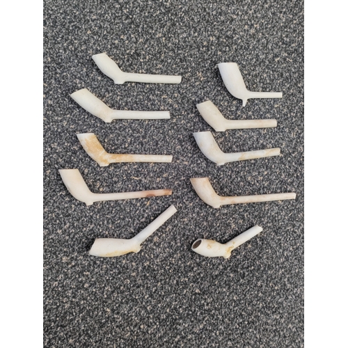 512 - A job lot of 10 Victorian clay pipes.