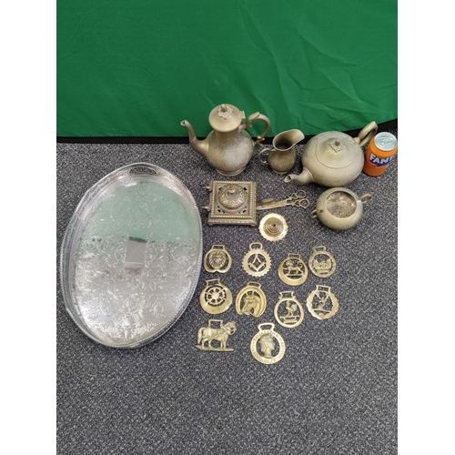 513 - A job lot of brass and a silver plated tray. Collection consists of horse brasses, teapots, an inkwe... 