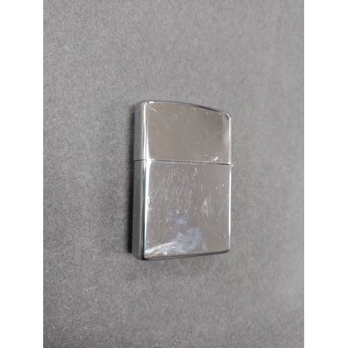 520 - Zippo lighter with Canadian flag. Made in Niagara Falls, Ontario