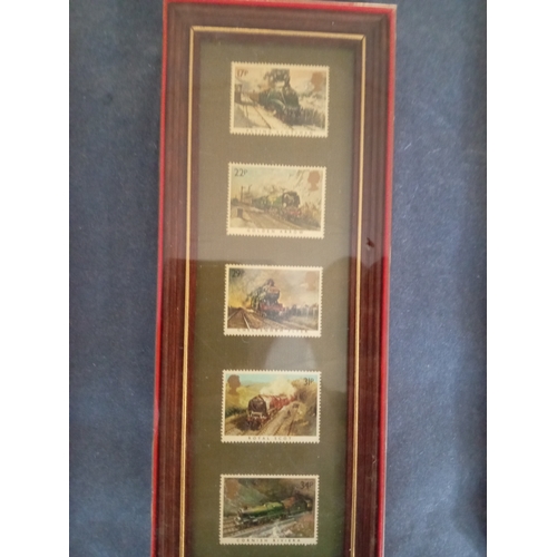 537 - Four framed and boxed sets of stamps including architecture, trains, coats of arms, commemorative.