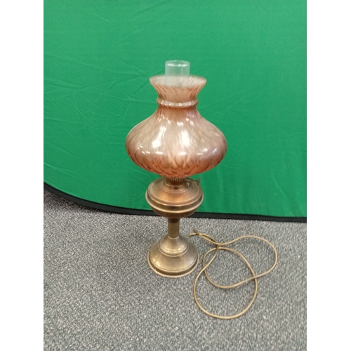 544 - Antique Brass and glass oil lamp converted to electric. Measures 57cm in height