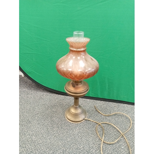 544 - Antique Brass and glass oil lamp converted to electric. Measures 57cm in height