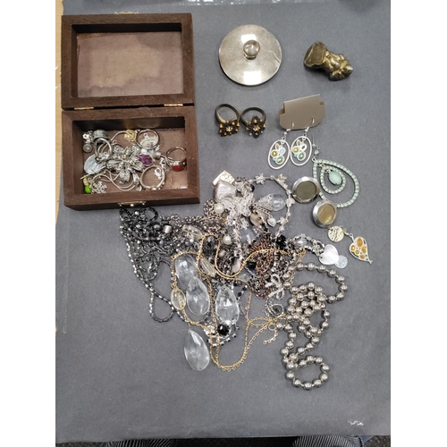 802 - A job lot of white metal jewellery. To include rings, necklaces, pendants, earrings, a small metal d... 