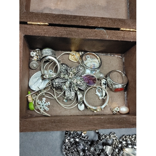 802 - A job lot of white metal jewellery. To include rings, necklaces, pendants, earrings, a small metal d... 