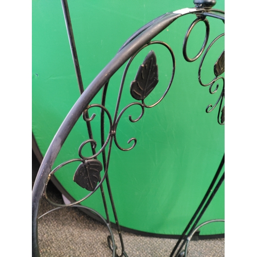 567 - Wrought iron garden ornaments/planters