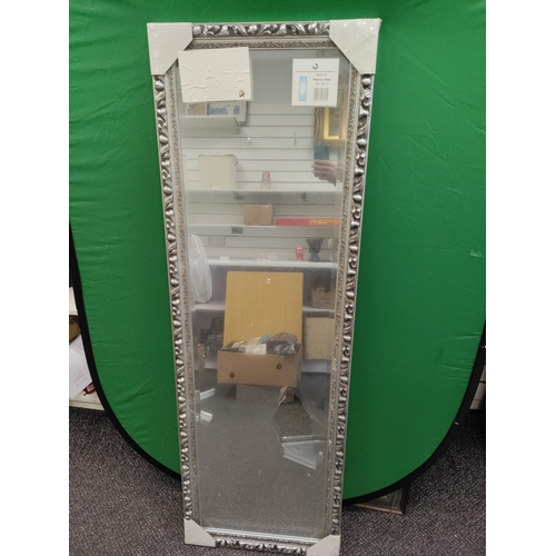 579 - Ornate brand new design full length mirror, wooden with silver finish. Includes mounting brackets. M... 