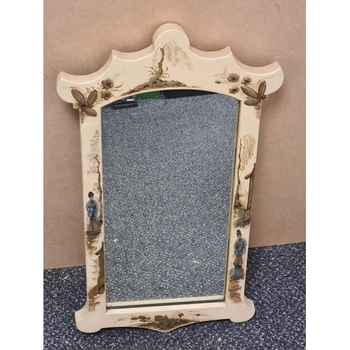 709 - Attractive Chinoiserie designed carved wood hand painted mirror. Measures H60cm x W34cm.