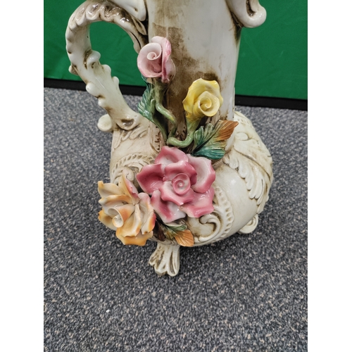 595 - Capodimonte - large mid century lidded jug with large modelled flowers. Height 65cm.