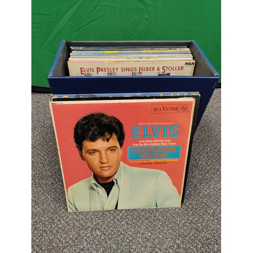 596 - 24 vinyl records in carry case with original key. Collection consists of Elton John, Genesis, Elvis,... 