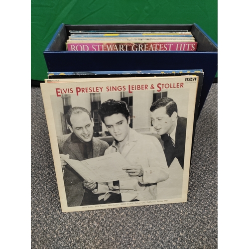 596 - 24 vinyl records in carry case with original key. Collection consists of Elton John, Genesis, Elvis,... 