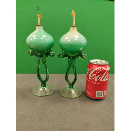 601 - A pair of green antique danube glass hand blown oil lamps.