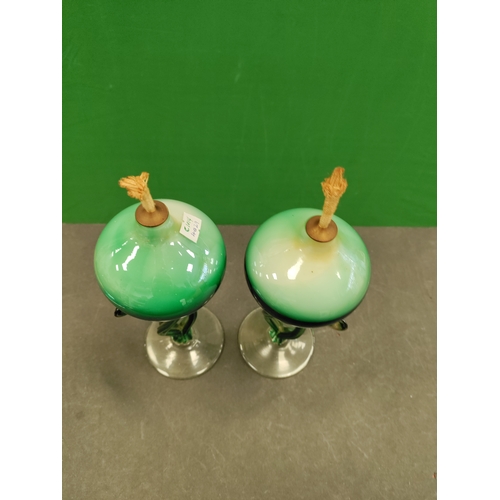 601 - A pair of green antique danube glass hand blown oil lamps.