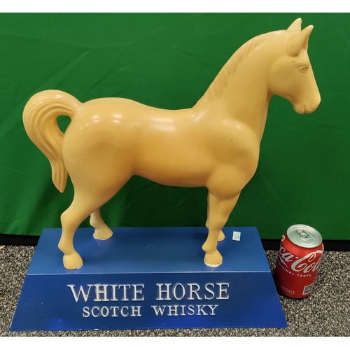 612 - Vintage early 1960's White Horse Scotch Whiskey advertising figure.