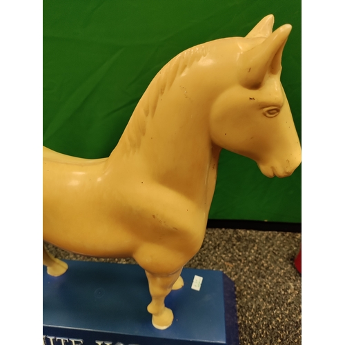 612 - Vintage early 1960's White Horse Scotch Whiskey advertising figure.