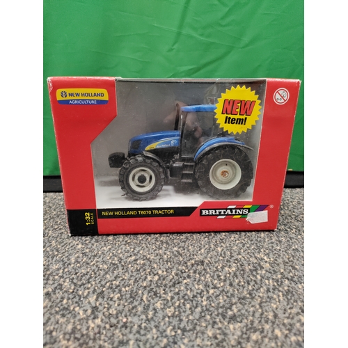 620 - Britains 43356 New Holland T6070 tractor. 1:32 scale